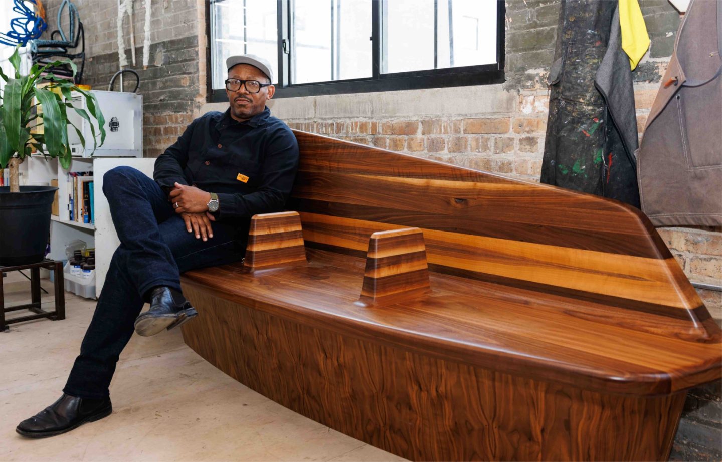 Norman Teague on one of the benches he designed for the Obama Presidential Center, 2026